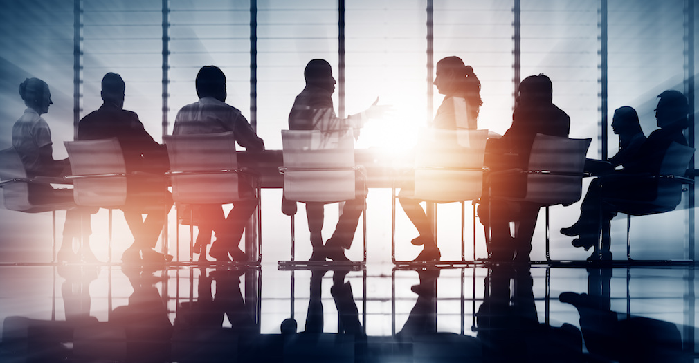 Group of Business People Meeting Back Lit Concept