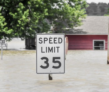 Flood-house-speed-limit-sign
