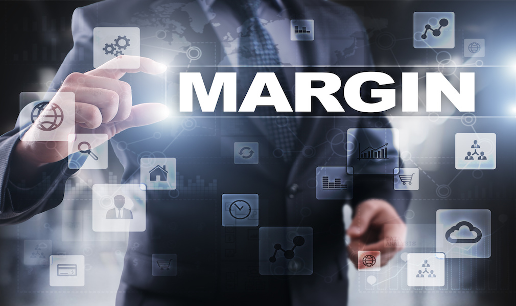 Businessman selecting margin on virtual screen.