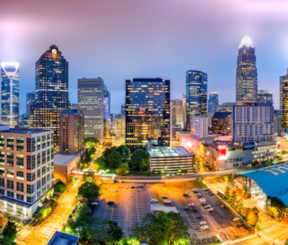 Aerial view of Charlotte, NC skyline on a foggy evening. Charlotte is the largest city in the state of North Carolina and the 17th-largest city in the United States
