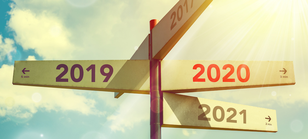 2020 New Year. Direction indicator in the number of the year, against the sky. New Year concept