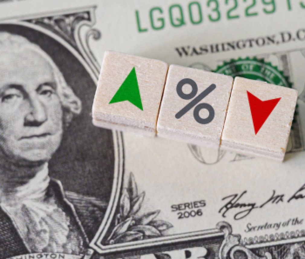 Concept idea of FED, federal reserve system is the central banking system of the united states of america and change interest rates. Percentage icon and arrow symbol on wooden cube
