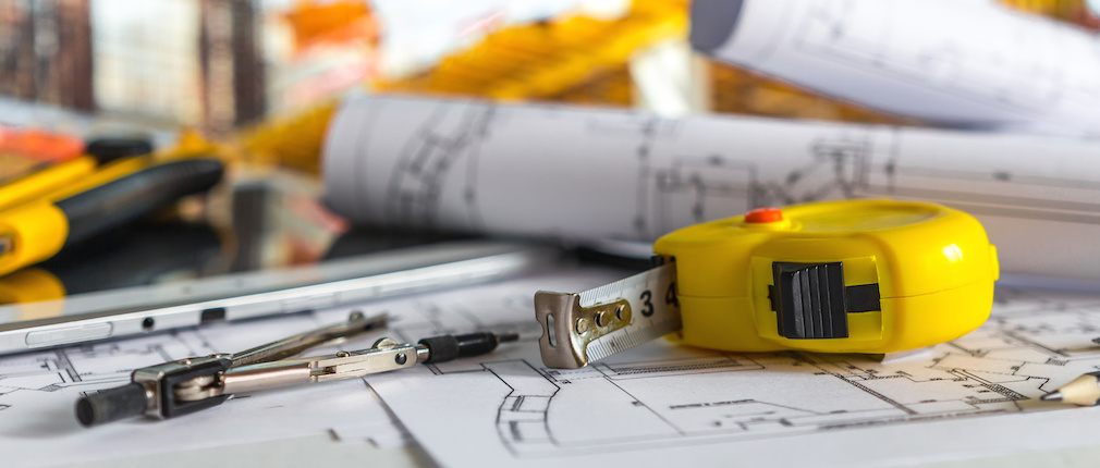 architect design working drawing sketch plans blueprints and making architectural construction model in architect studio long banner