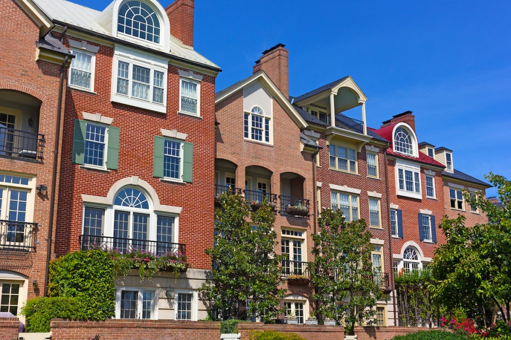 Modern houses facing Old Town Alexandria waterfront in Virginia, USA. Highly sought after residential development in Alexandria neighborhood.