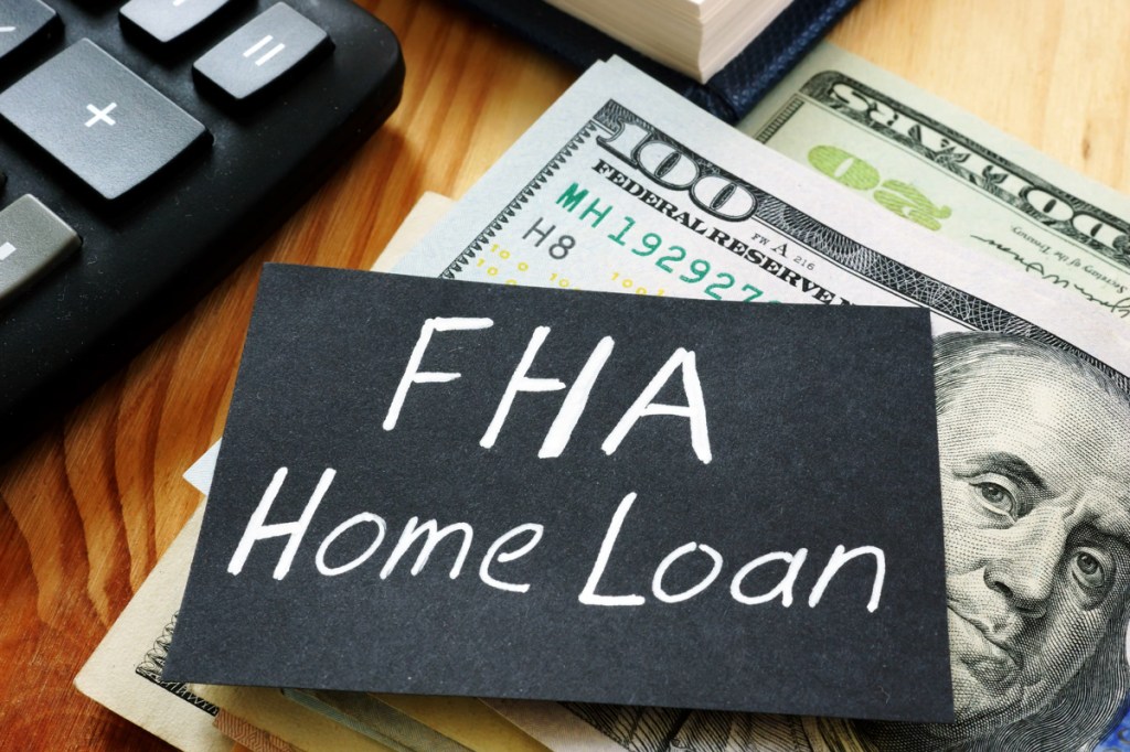 mortgage applications, Text sign showing hand written words FHA Home loan