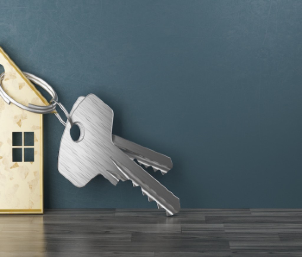 Mortgage, investment, real estate and property concept - close up of house keys. 3d rendering