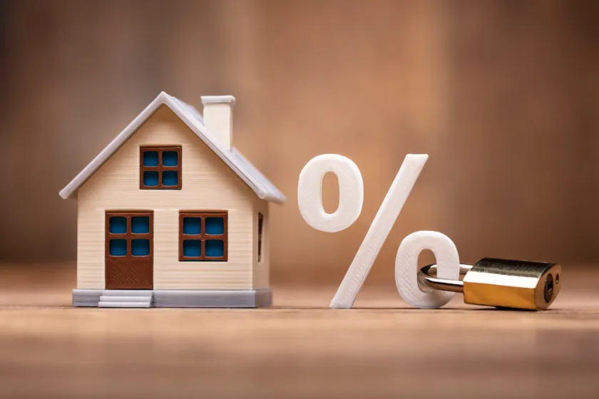 House Model Near Percentage Sign With Keypad Lock