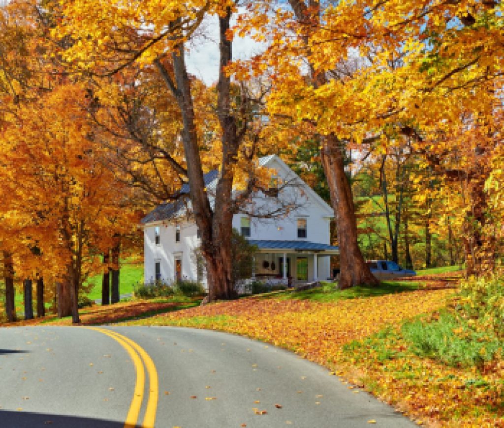 Highway at sunny autumn day in Vermont, USA