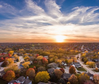 Sunset in the fall over the suburbs
