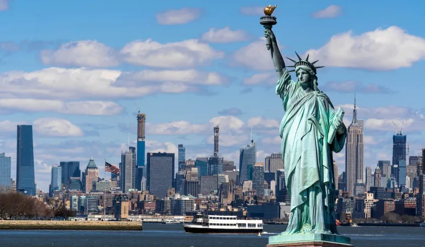 The Statue of Liberty over the Scene of New york cityscape river side which location is lower manhattan,Architecture and building with tourist concept