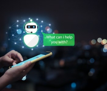 artificial intelligence,AI chat bot concept.Hands holding mobile phone on blurred urban city as background