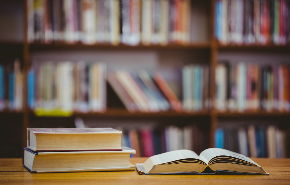 Books-on-desk-in-library-at-the-elementary-school