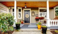 front porch of a small two story home