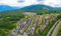 birds-eye view of middle income single-family home mountain neighborhood