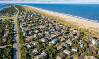 birds-eye view of high income single-family home beach coastal neighborhood