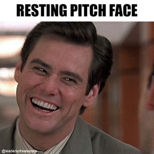 Meme of Jim Carrey smiling with teeth showing.