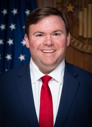 Official portrait of Andrew Hughes, Deputy HUD Secretary during the second Trump administration.
