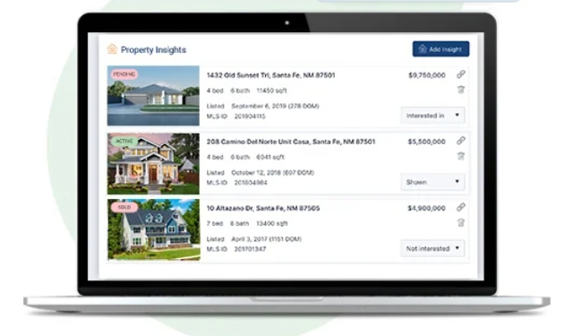 Property insights from Top Producer presented on laptop.