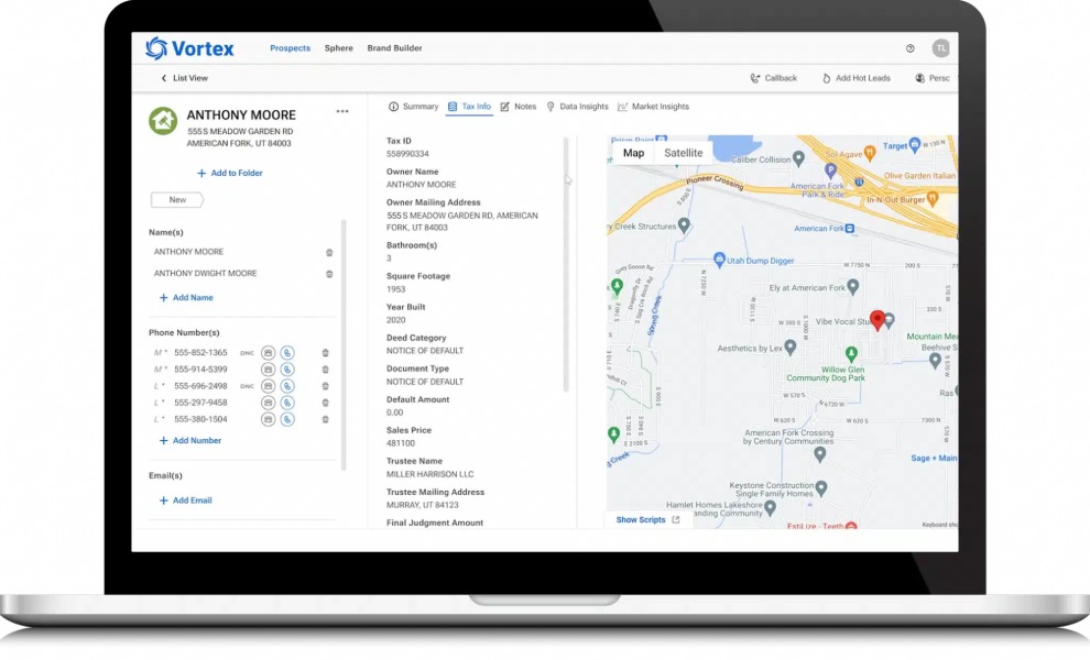 Laptop opened with Vortex dashboard open showing a map to the right and lead details to the left.